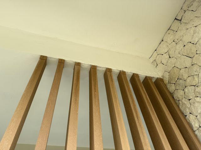 Renovated ceiling with angled timber battens at Karma Kandara