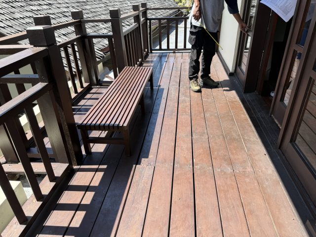 Covered walkway with a timber railing during the Karma Kandara villa renovation
